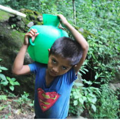 Boy carrying water